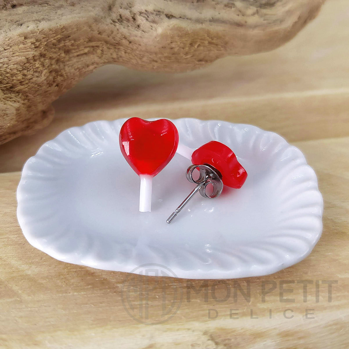 Back view of handmade red heart lollipop stud earrings with stainless steel posts